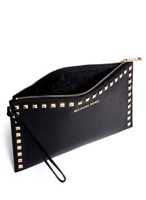 black michael kors selma clutch|michael kors black clutch bag.